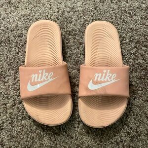 Girls pink Nike slides size 2